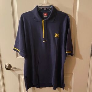 Nike Men's Michigan Wolverines Polo Shirt in Navy with Yellow Details